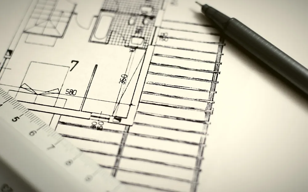 Plano con escalímetro de una consultora técnica